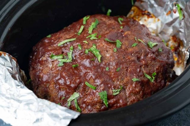 closeup of meatloaf in a slow cooker