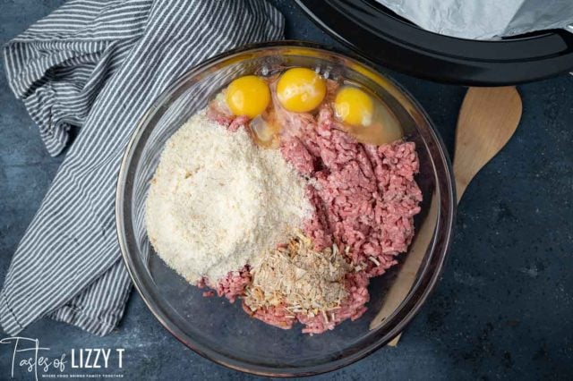 eggs, meat and crumbs in a bowl