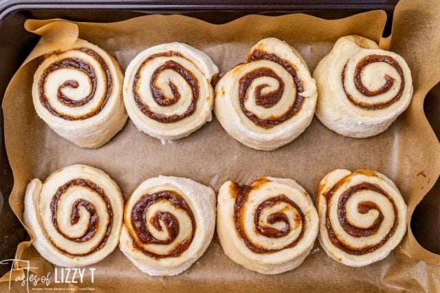 unbaked cinnamon rolls in a pan