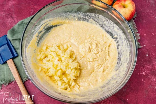 shredded apples in cornbread batter