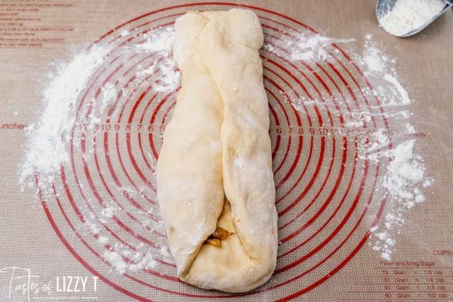 long dough rolled out on a baking mat