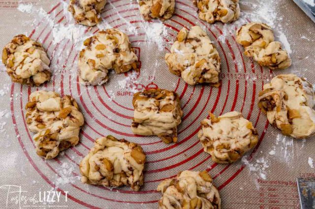 unfried apple fritters on a table