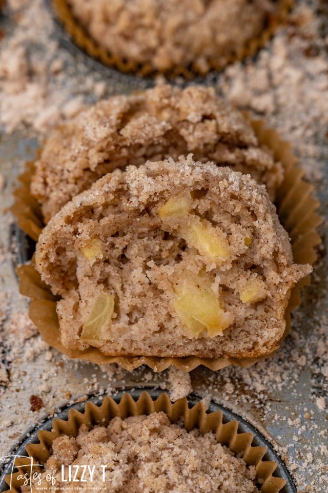 apple muffins in a baking pan with streusel