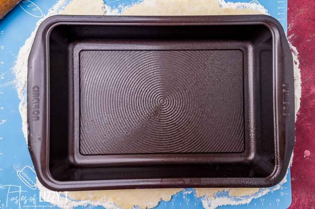 brown 9x13 baking pan over pie dough