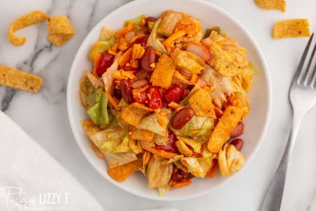 a plate full of frito taco salad