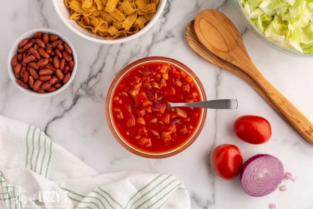 mixed tomatoes and onions in a bowl