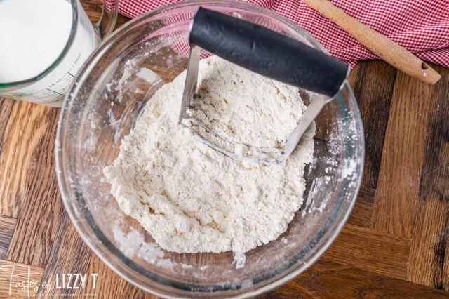 flour and butter cut together in a mixing bowl