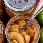 two jars of apple pie filling, one closed and one open