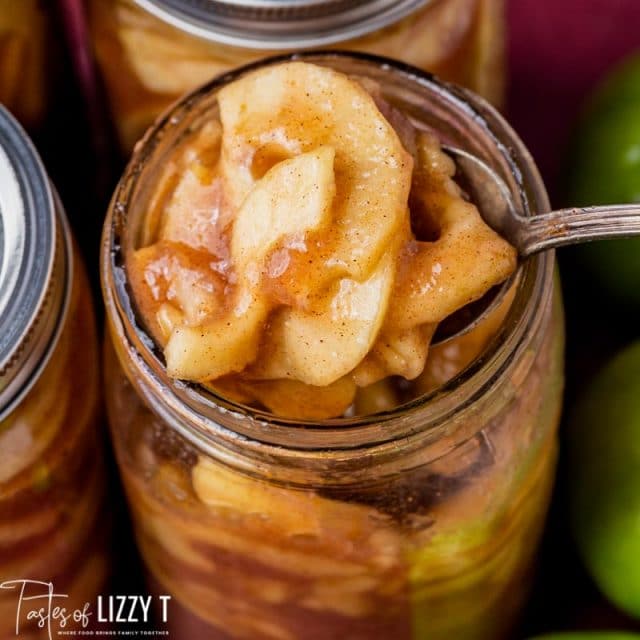 spoonful of apple pie filling in a jar