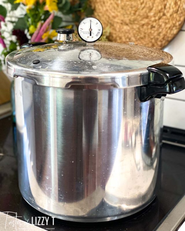 pressure cooker sitting on a stove
