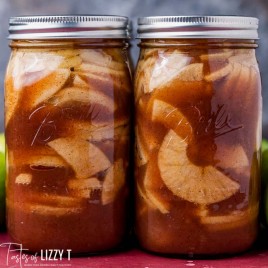 closeup picture of two jars of apple pie filling