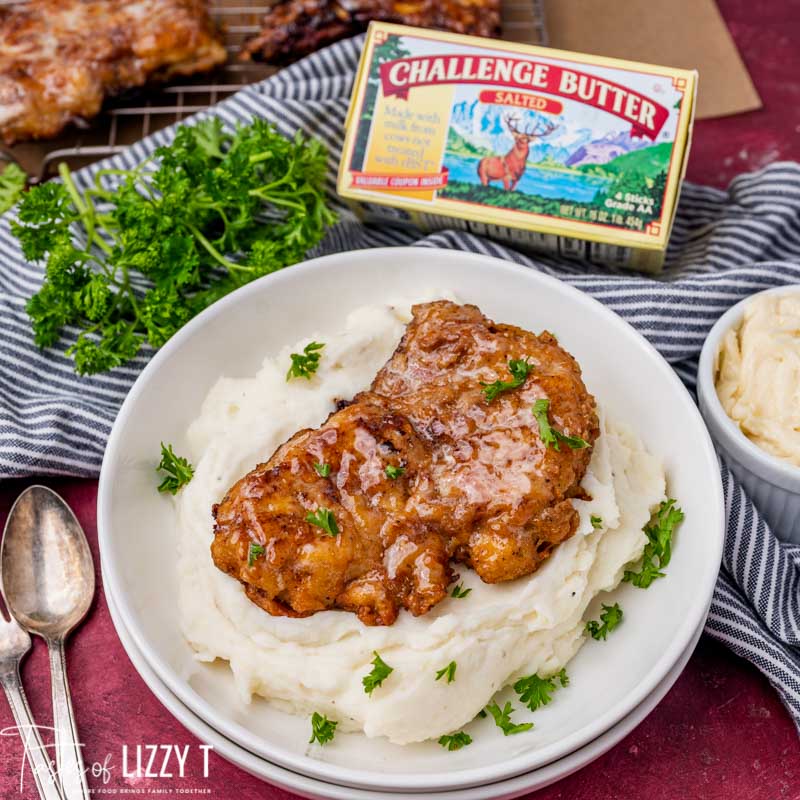 honey butter fried chicken over potatoes