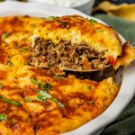 a slice of impossible taco pie on a spatula