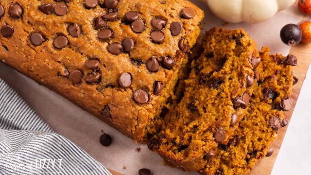 partially sliced loaf of pumpkin bread