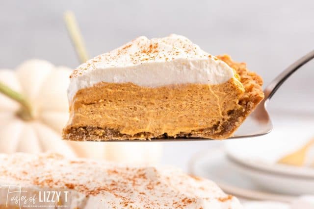 a slice of no bake pumpkin pie on a spatula