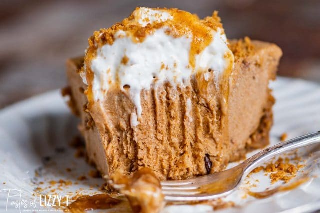 a piece of no bake pumpkin pie with a bite out