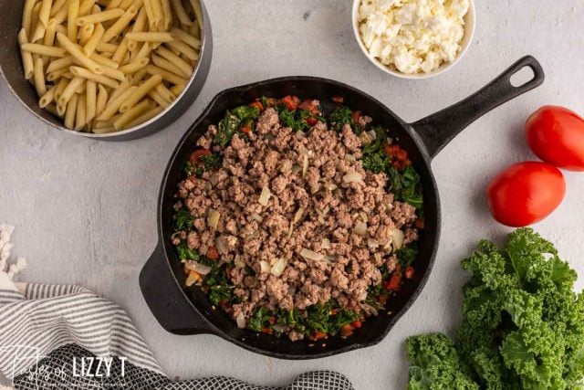 browned sausage in a skillet