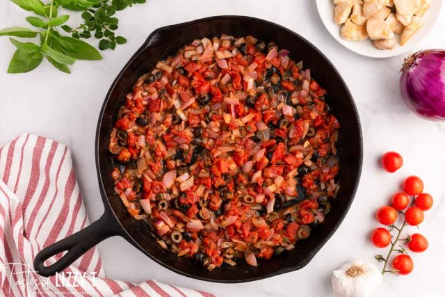 sauteed vegetables in a cast iron skillet