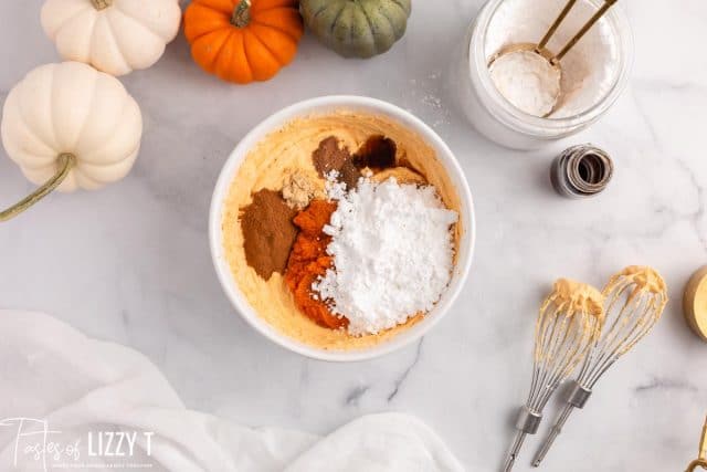 pumpkin cheesecake batter in a bowl before mixing