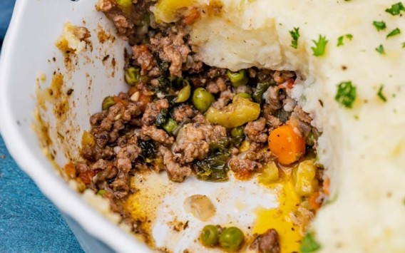 closeup of ground beef casserole with mashed potatoes