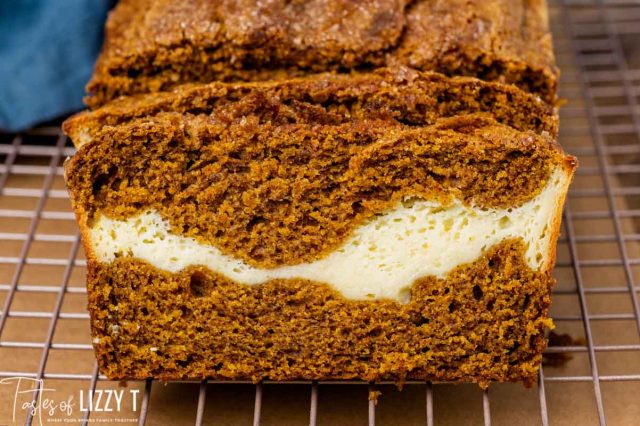 sliced pumpkin bread on a wire cooling rack