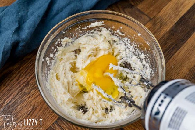 egg mixing into cream cheese