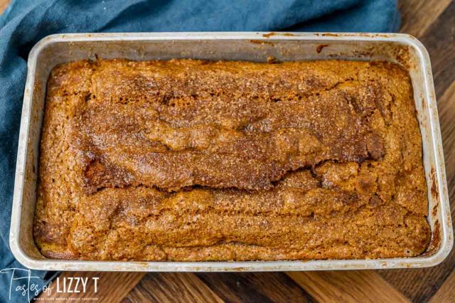 overhead view of a loaf of baked pumpkin bread