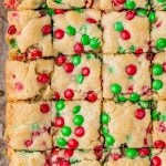 overhead view of cut sugar cookie bars with m&ms