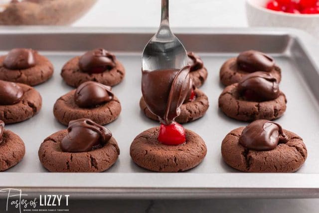 spoon dolloping chocolate on a cookie