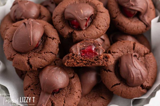 chocolate covered cherry cookies with one cut in half