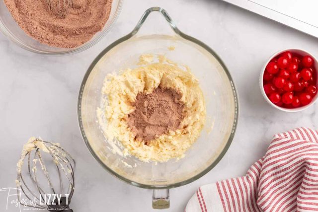 dry ingredients over butter mixture in a mixing bowl