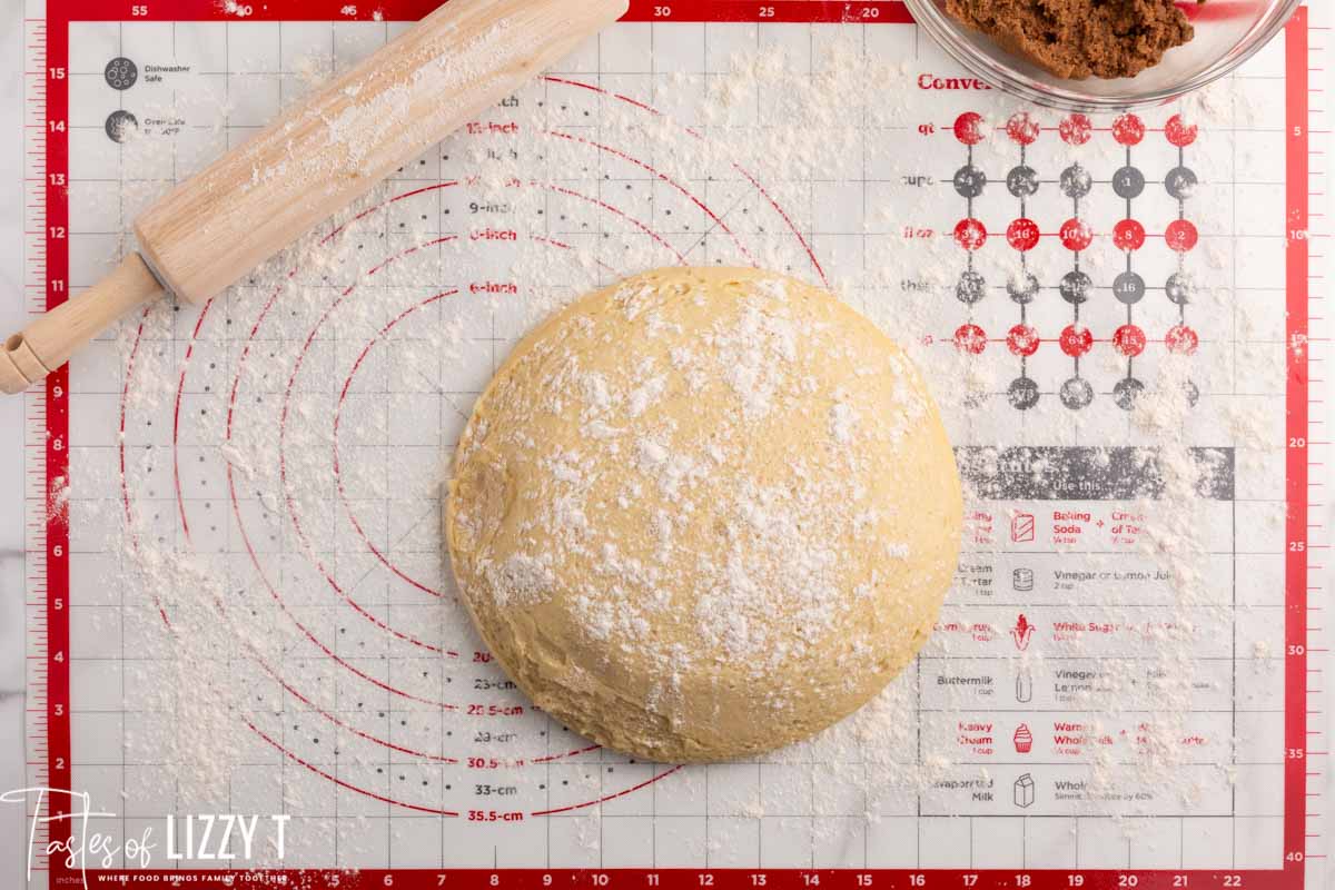 bread dough sitting on a pastry mat