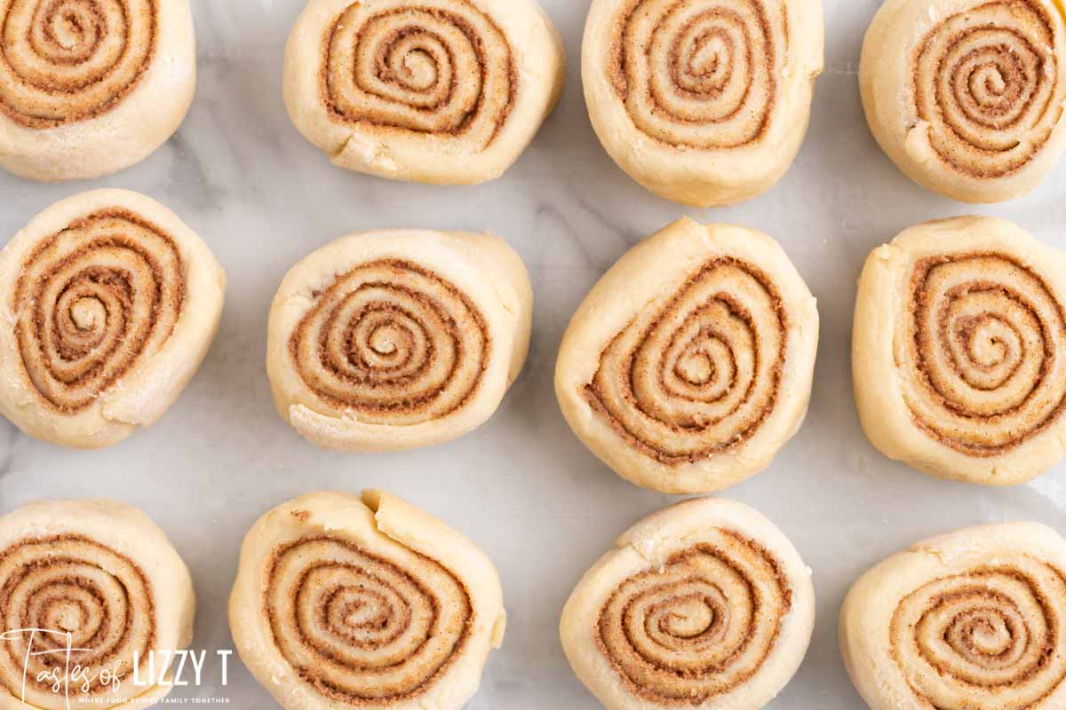 unbaked cinnamon rolls on a table