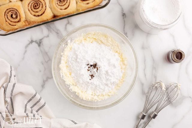 creamed butter and sugar with powdered sugar over the top