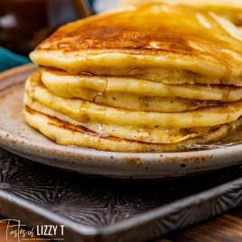 closeup of a plate of cornmeal pancakes