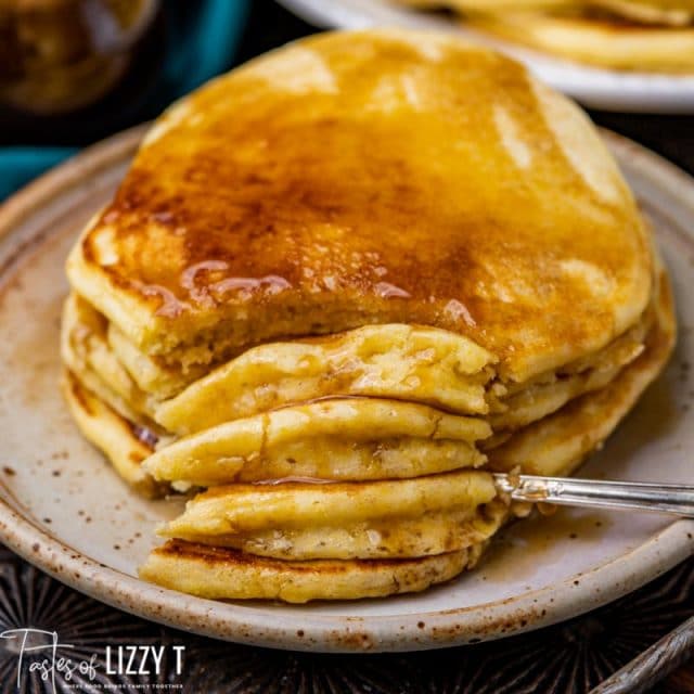 cornmeal pancakes with a for cutting one bite