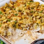chicken casserole with a scoop out of the baking pan