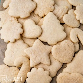 pile of ufrosted christmas cut out cookies