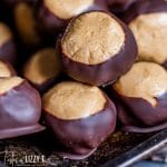 a pile of chocolate buckeyes on a table