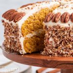 closeup of a pumpkin spice cake with pecans