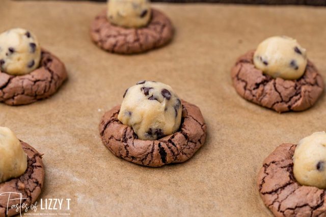brownie cookies with a ball of cookie dough on top