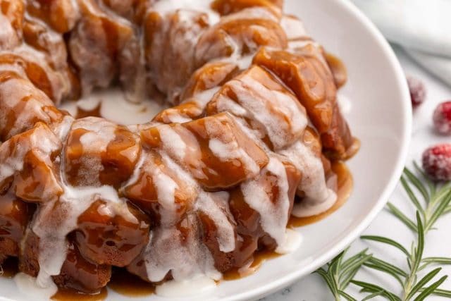 closeup of glazed eggnog monkey bread