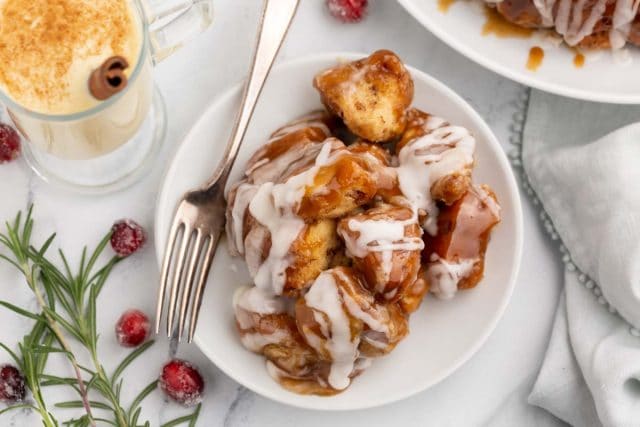 overhead shot of eggnog monkey bread on a plate