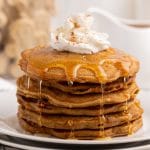 a stack of ginger spice pancakes with syrup
