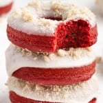 3 red velvet doughnuts stacked on each other