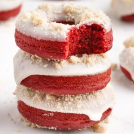 3 red velvet donuts stacked on each other