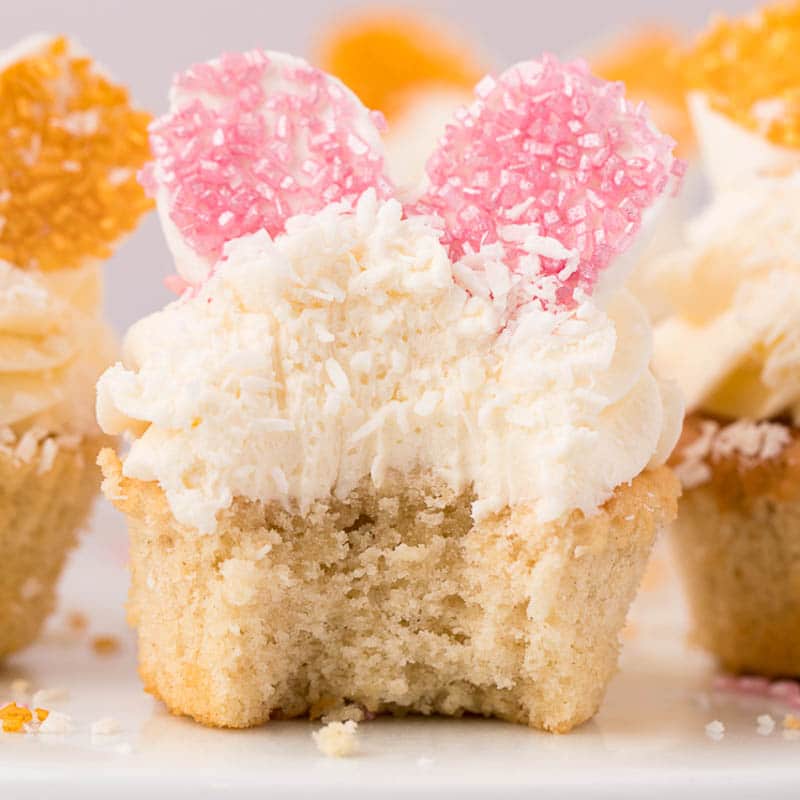 an easter bunny cupcake with a bite out