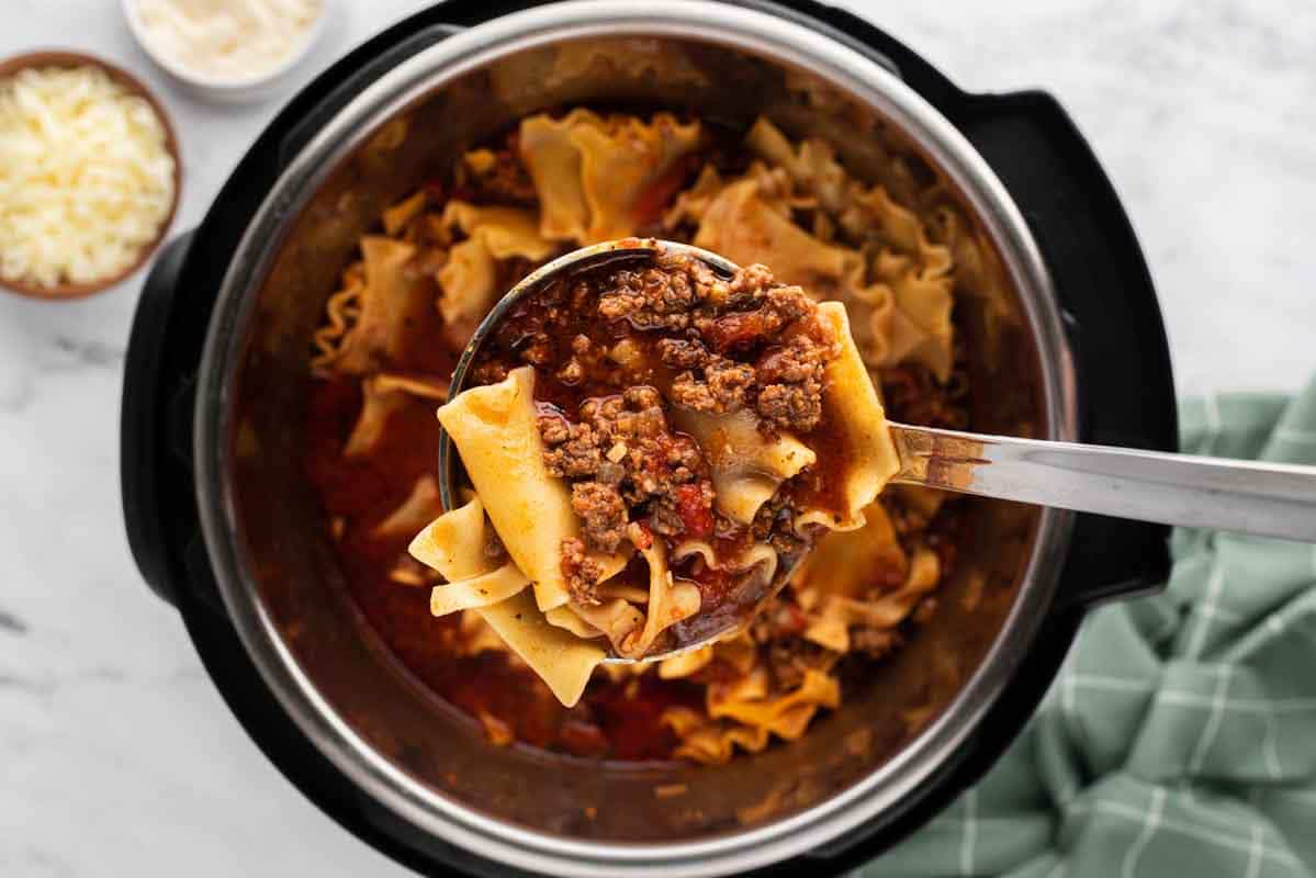 ladle of soup over an instant pot