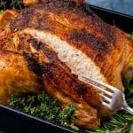roasted chicken in a baking pan