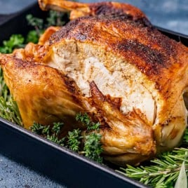 closeup of golden brown oven roasted chicken